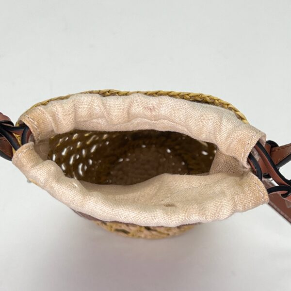 Cylinder Pouch Brown Crossbody Bag in Raffia - Image 10