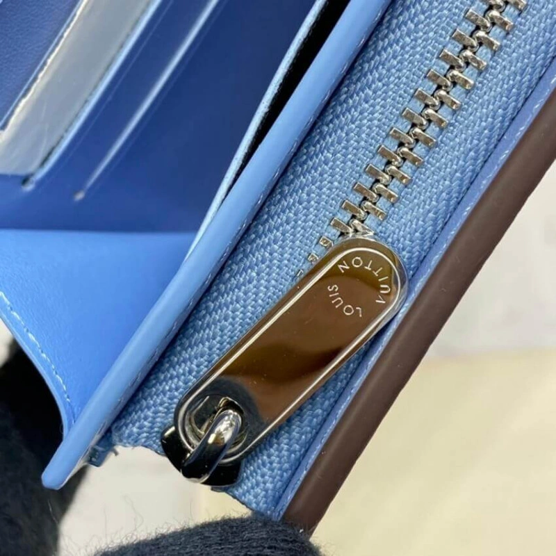 1 zipped Louis Vuitton Iris Compact Wallet in Blue Gradient Mahina Perforated Leather - Image 9