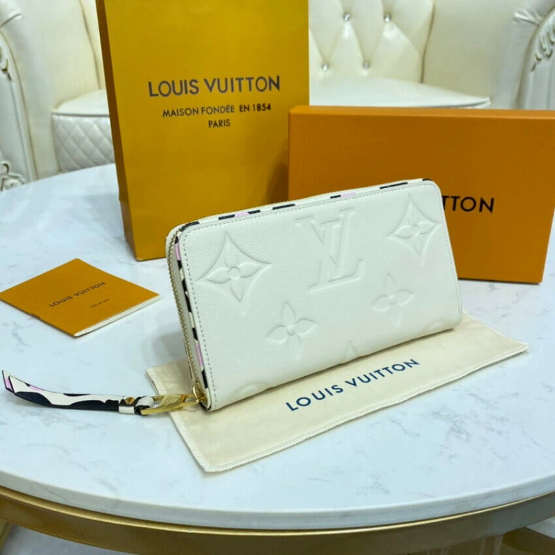 Louis Vuitton Monogram Empreinte Leather with Animal-Print Zippy Wallet Cream - Image 3